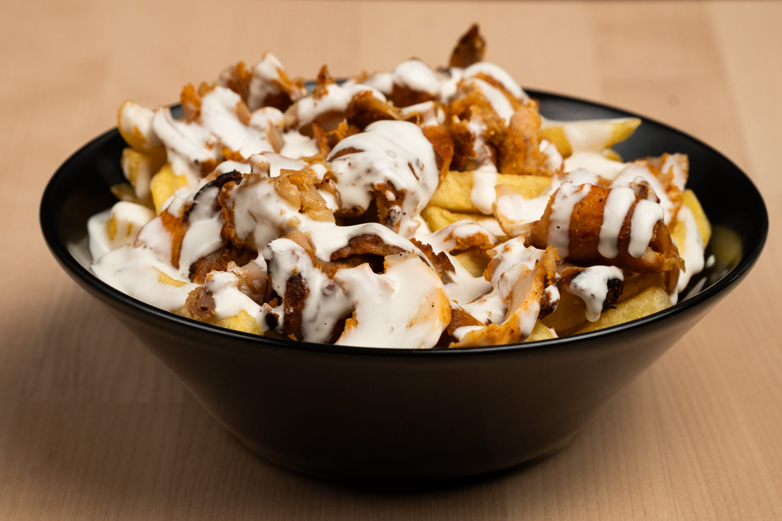 wooden table with a bowl of fries and meat topped 2025 02 10 06 08 10 utc scaled